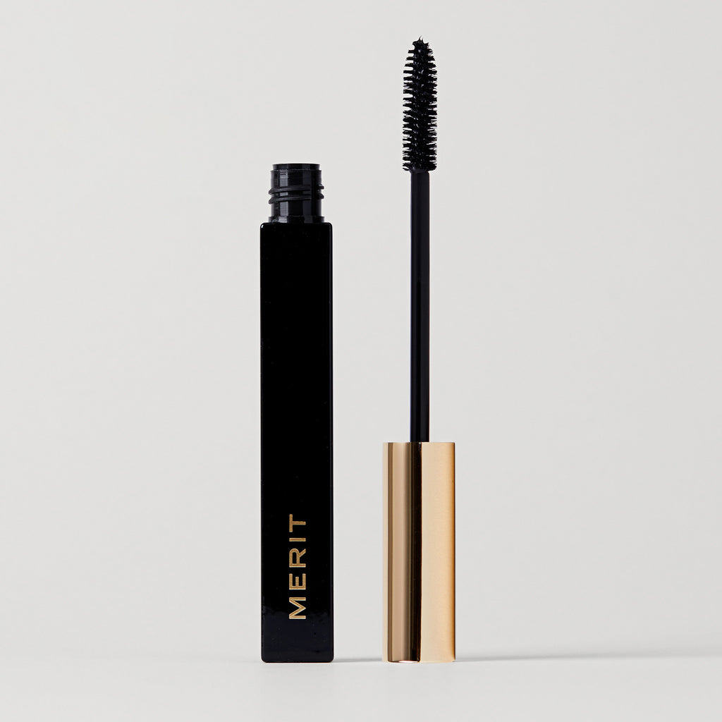 Master || Clean Lash Mascara wand with black mascara is shown alongside a mascara tube that has won an Allure Best of Beauty Award in 2021.