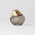Master || Full-Size (30ml) Bottle of Retrospect perfume with a gold cap and MERIT written on the front