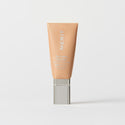 Master || A tube of MERIT brand mineral sunscreen with a sheer tint finish, providing broad spectrum 50 UVA/UVB protection, displayed against a white background. Shade 20