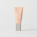 Master || A tube of MERIT brand mineral sunscreen with a sheer tint finish, providing broad spectrum 45 UVA/UVB protection, displayed against a white background. Shade 30
