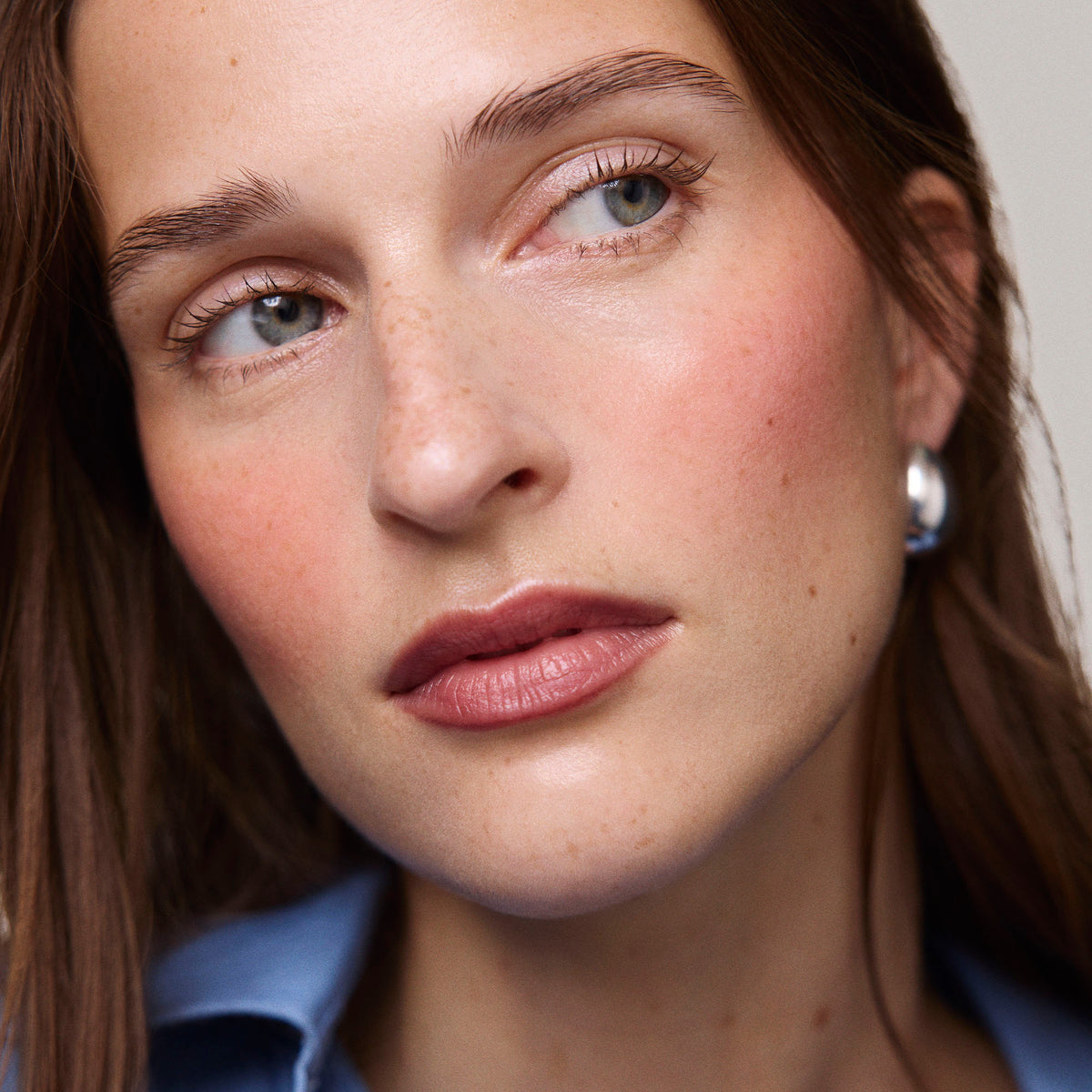 Master ||  Model is wearing Flush Balm in shade Archival.