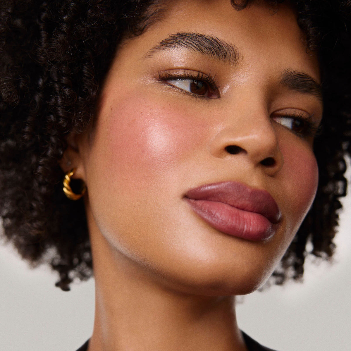 Master || Model is wearing Flush Balm in shade Cheeky.