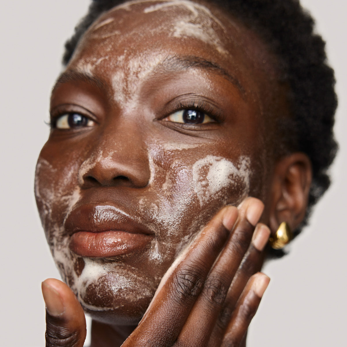 Master || Model is applying Great Skin Double Cleanse.