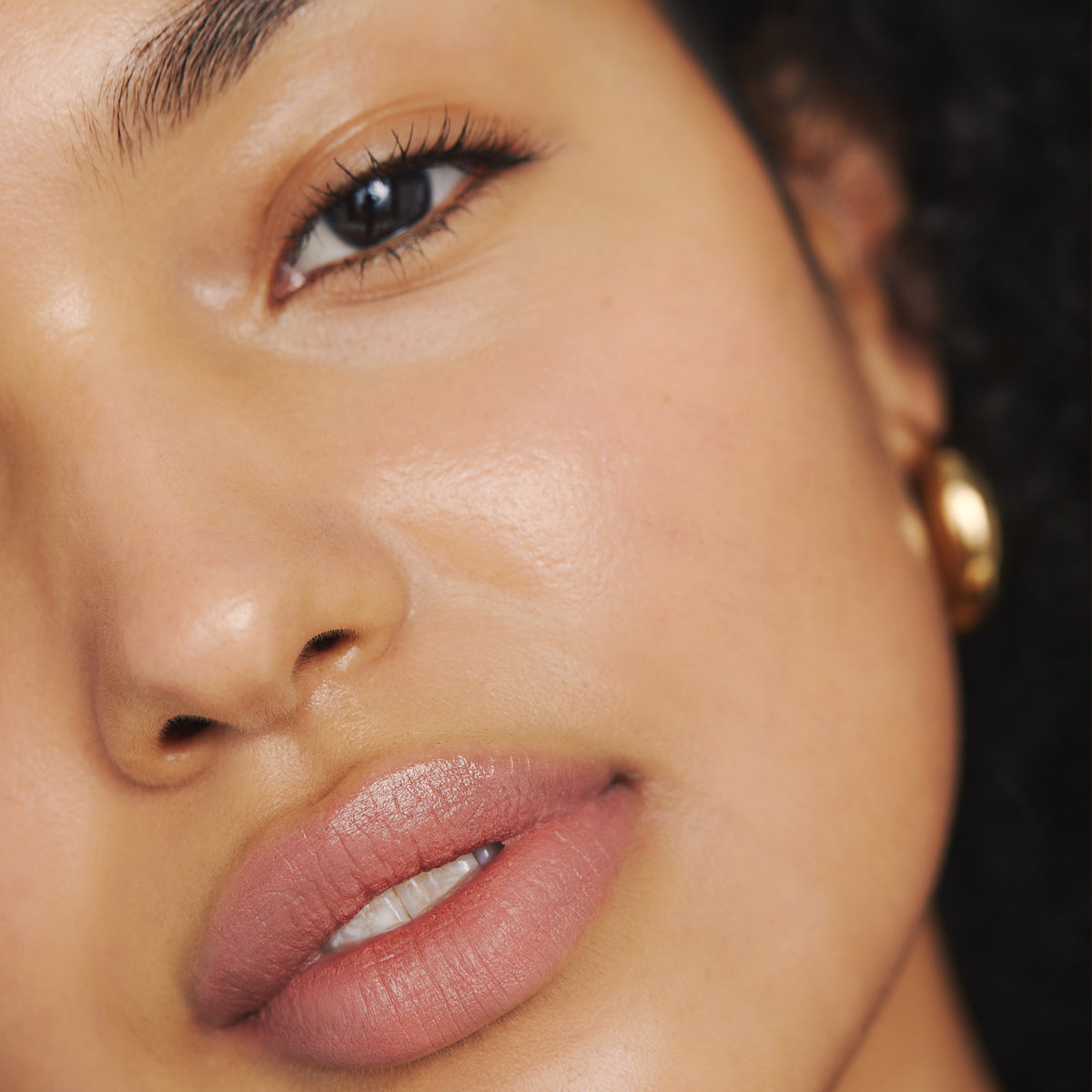 Citrine | face | Model is wearing Day Glow in Citrine